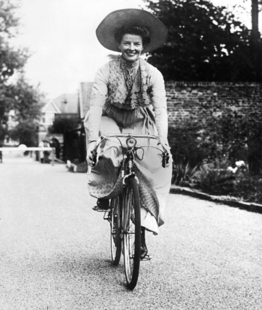 Katherine Hepburn riding a bicycle. Photo by Getty Images