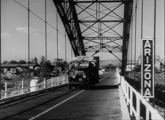 Trailer for the 1940 black and white film The Grapes of Wrath. Truck on a bridge.