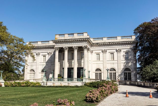 Exterior view of the historic Marble House in Newport Rhode Island. This former Vanderbilt Mansion is now a well known travel attraction.