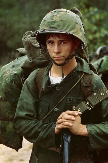 A young Marine private waits on the beach during the Marine landing, Da Nang, August 3, 1965.