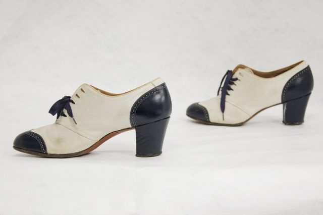 Woman’s lace-up two-tone brogue style shoe. Photo by Auckland Museum CC BY 4.0
