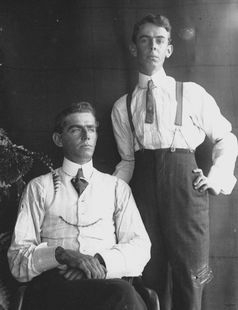 Two men photographed in studio style, 1890-1900