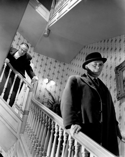 Welles fell ten feet while shooting the scene in which Kane shouts at the departing Boss Jim W. Gettys; his injuries required him to direct from a wheelchair for two weeks.