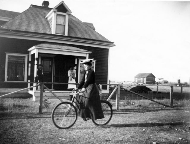 Woman on Bicycle 1910