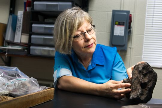 Central Michigan University Professor Mona Sirbescu shows off a meteorite. Mackenzie Brockman/Central Michigan University