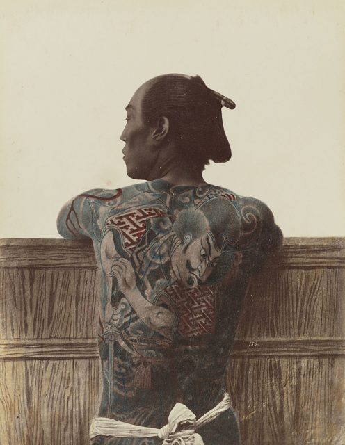 A tattooed man’s back, c. 1875.