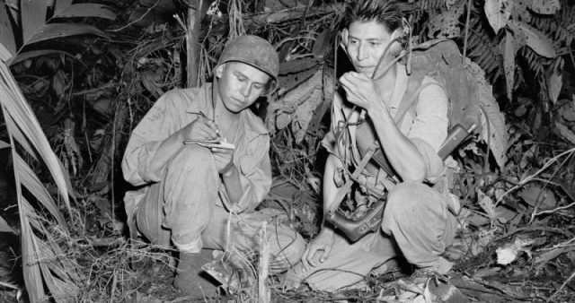 Navajo Indian Code Talkers Henry Bake and George Kirk, December 1943. Photo by U.S. Marine Corps, Department of the Navy, Department of Defense