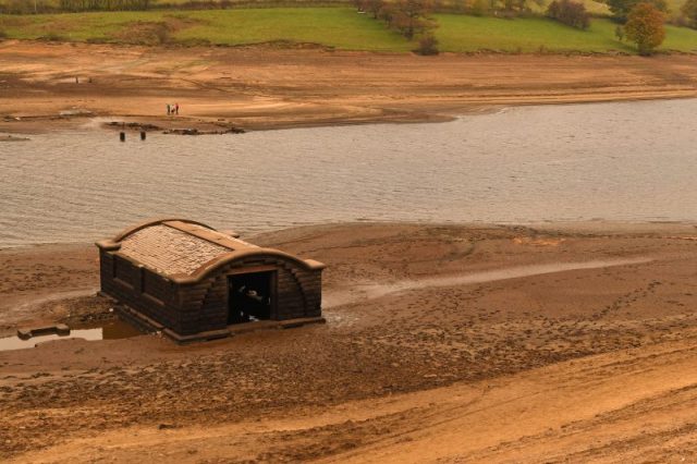 Ladybower reservoir’s low water level has revealed the pump house from Derwent village, flooded to create the reservoir in 1943, in the Upper Derwent Valley in Derbyshire, northern England on November 6, 2018. The reservoir’s water level is particularly low after the dry hot summer in the UK. Photo credit PAUL ELLIS/AFP/Getty Images