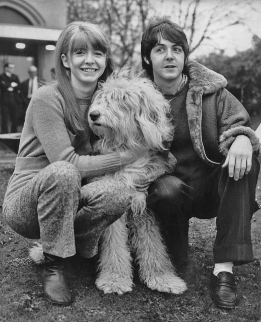 Beatles singer and musician Paul McCartney with his girlfriend Jane Asher and their Old English Sheepdog named Martha outside the Golden Gates Hotel in Glasgow, Scotland, December 11, 1967 . Photo by Daily Express/Archive Photos/Getty Images