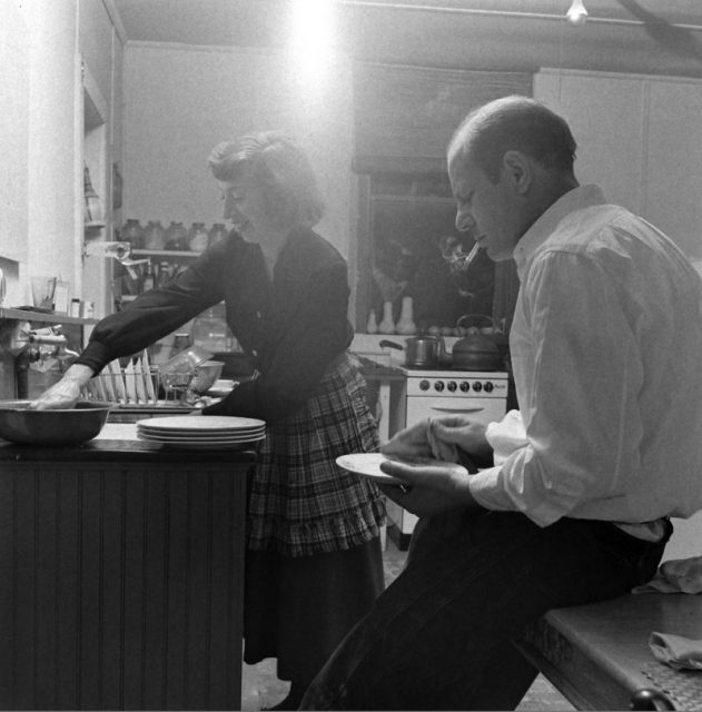 Married artists Lee Krasner (1908 – 1984) (left) and Jackson Pollock (1912 – 1956) wash and dry dishes in the kitchen of their farmhouse in New York, April 1949. (Photo by Martha Holmes/The LIFE Picture Collection/Getty Images)
