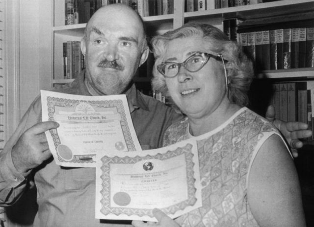 Atheist Madalyn Murray O’Hair (right) and her husband Richard, display charters forming ‘Poor Richard’s Church of Universal Life’ and making O’Hair the official Prophet of the church. Mrs. O’Hair said she is forming the church to undermine the tax exempt status of other churches.
