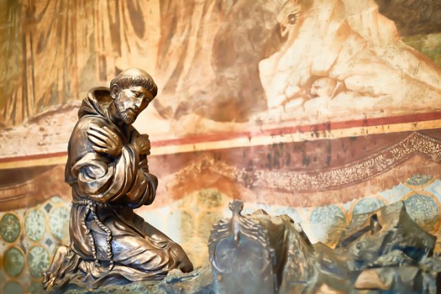 Interior sculpture of Saint Francis in the main church in Assisi, Perugia, Umbria, central Italy