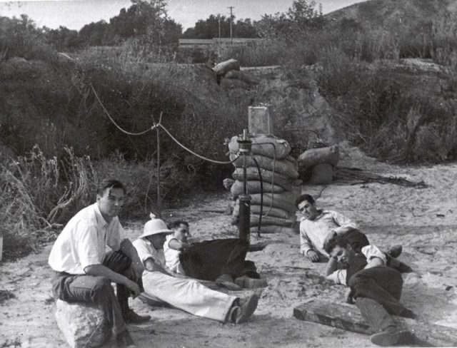 GALCIT Group members in the Arroyo Seco, November 1936. Left foreground to right: Rudolph Schott, Amo Smith, Frank Malina, Ed Forman, and Jack Parsons.