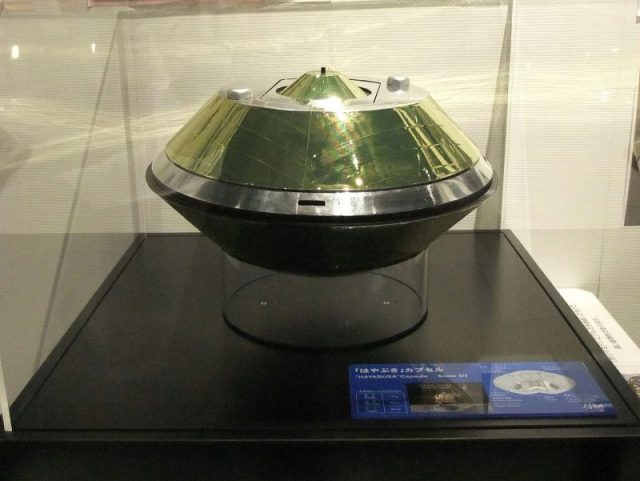 Replica of Hayabusa’s sample-return capsule (SRC) used for re-entry. Hayabusa2’s capsule is of the same size, measuring 40 cm in diameter and will deploy a parachute. Photo by Mj-bird CC BY-SA 3.0