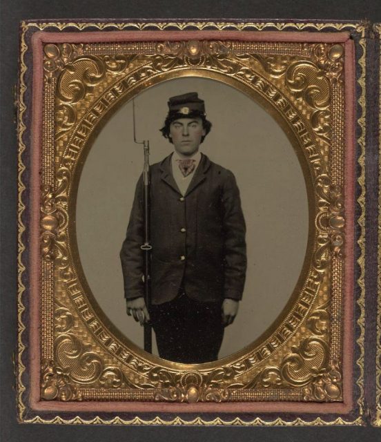 Unidentified soldier in Union uniform with bayoneted musket.