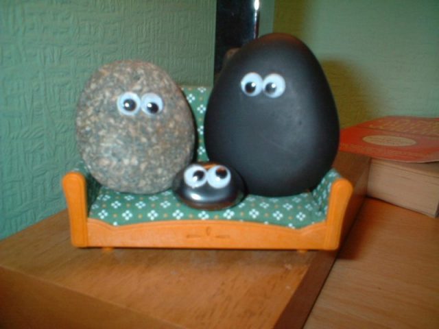 Image of imitation pet rocks. The original rocks had no eyes. Photo by Pet Rock Net CC BY-SA 3.0