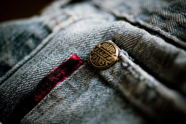 Copper rivets for reinforcing pockets are a characteristic feature of blue jeans. Photo by Marcos André CC BY 2.0