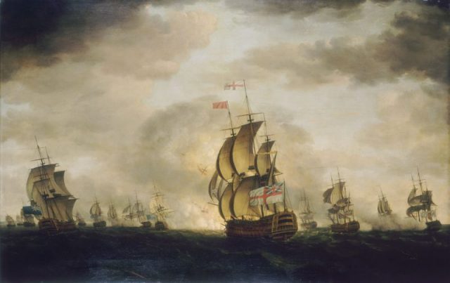 HMS Sandwich fires into the French flagship Bucentaure (the vessel shown dismasted in foreground, left of centre) at the Battle of Trafalgar. Bucentaure also fights HMS Victory (behind her) and HMS Temeraire (left side of the picture). In fact, Sandwich did not fight at Trafalgar; her presence in this painting is due to a mistake by the painter, Auguste Mayer.