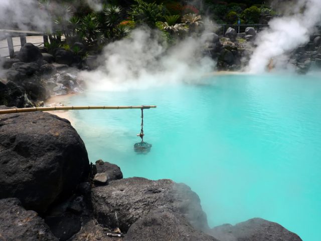 Famous hot spring in Beppu Oita, Japan. There are eggs cooking in the basket.