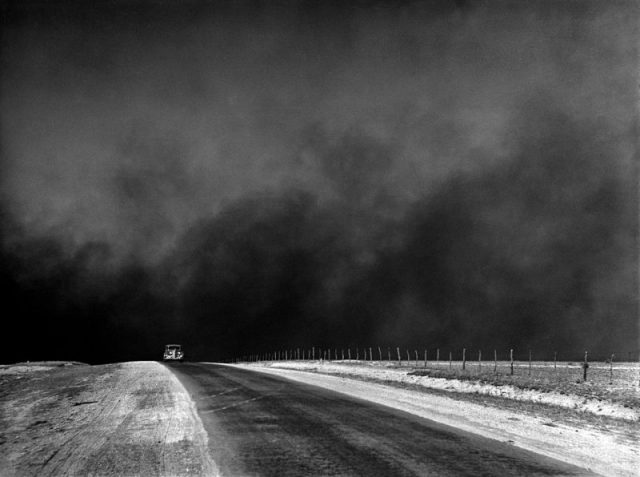 Heavy black clouds of dust rising over the Texas Panhandle, Texas, c. 1936.