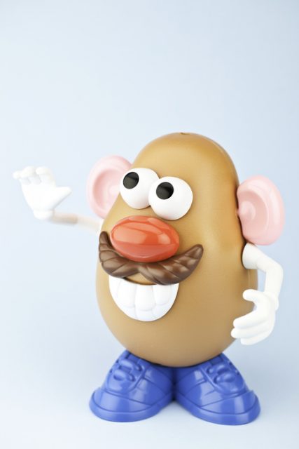 Suffolk, Virginia, USA – April 30, 2011: A vertical studio shot of the children’s toy, Mr Potato Head.