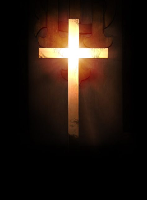 A glowing cross standing on an altar in an English church