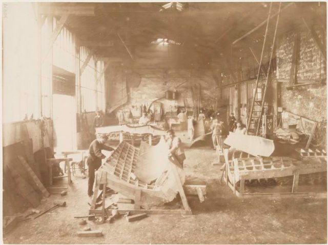 Men in a workshop shaping sheets of copper for the construction of the Statue of Liberty