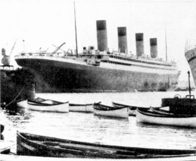 Olympic’s new lifeboats, ready to be installed. Another source posits that they are Titanic’s remaining lifeboats having been brought back to Southampton by Olympic.