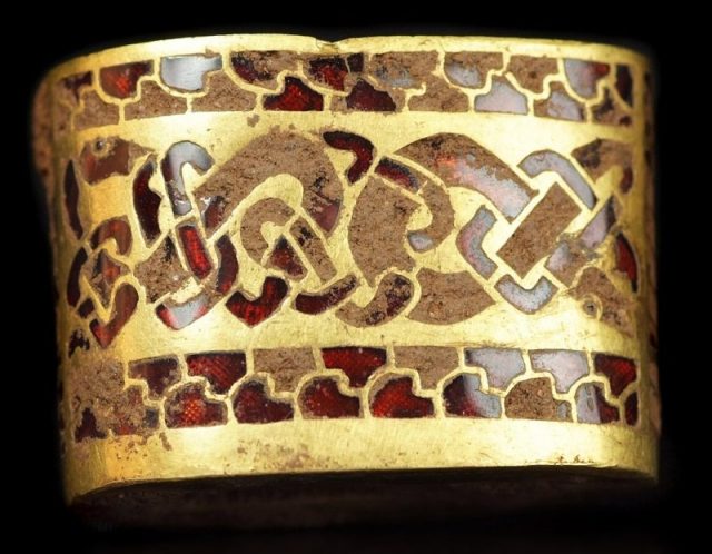 A hilt fitting from the Staffordshire hoard, which was declared to be treasure in September 2009. Photo by portableantiquities – Hilt Fitting CC BY 2.0