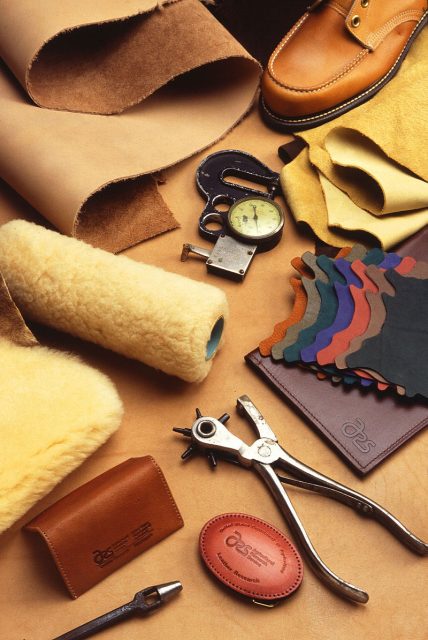 A variety of leather products and leather-working tools