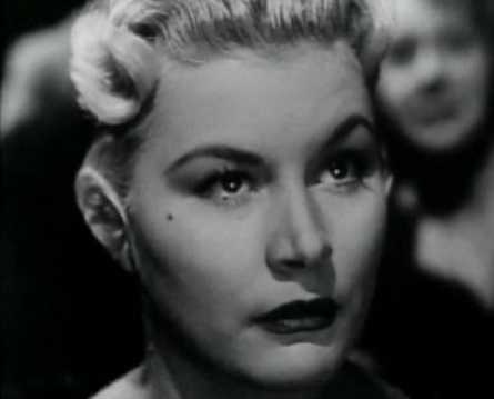 screenshot of Barbara Payton from the trailer for the film The Flanagan Boy (1953) (also known as Bad Blonde)