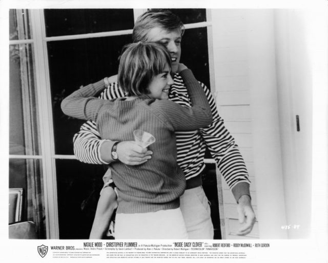 Natalie Wood is held by Robert Redford in a scene from the film ‘Inside Daisy Clover’, 1965. Photo by Warner Brothers/Getty Images