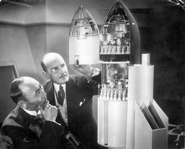 Still from 1929 German movie ‘Frau im Mond’ (The Woman in the Moon). Investors examine a model of the spaceship Friede.
