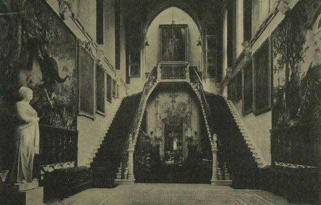 The hall and grand staircase of Highcliffe Castle in 1907. On the left is the statue of Lady Waterford by Joseph Boehm
