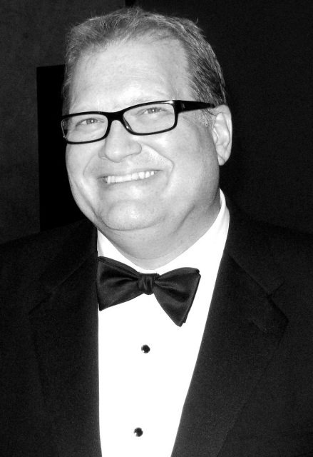 Drew Carey (host since October 2007). Photo by Cyan Banister CC BY 3.0