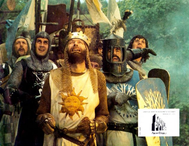 Monty Python And The Holy Grail, lobbycard, rear from left: Eric Idle, Michael Palin, center from left: John Cleese, Terry Jones (helmet), Graham Chapman as King Arthur (front), 1975. Photo by LMPC via Getty Images