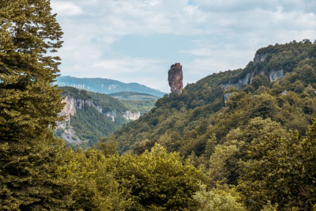 The Katskhi pillar in Imereti, Georgia. The orthodox church can be seen high on the rocky cliff.