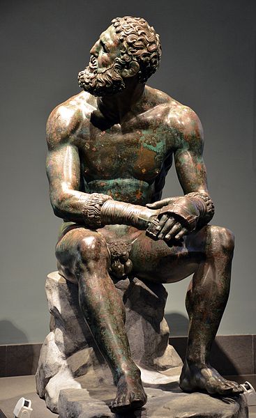 Resting boxer statue