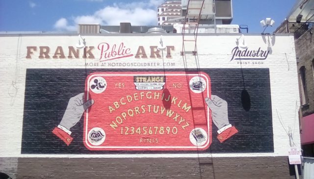 Ouija board painted on a two story building in downtown austin, texas. Mitchellhobbs – cc by-sa 4. 0