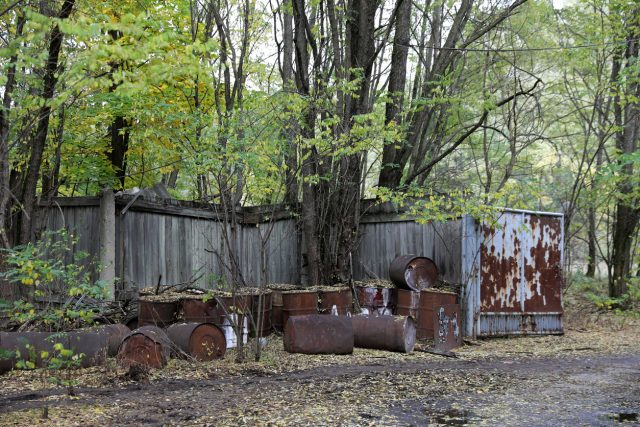 Old empty barrels abandoned in Chernobyl