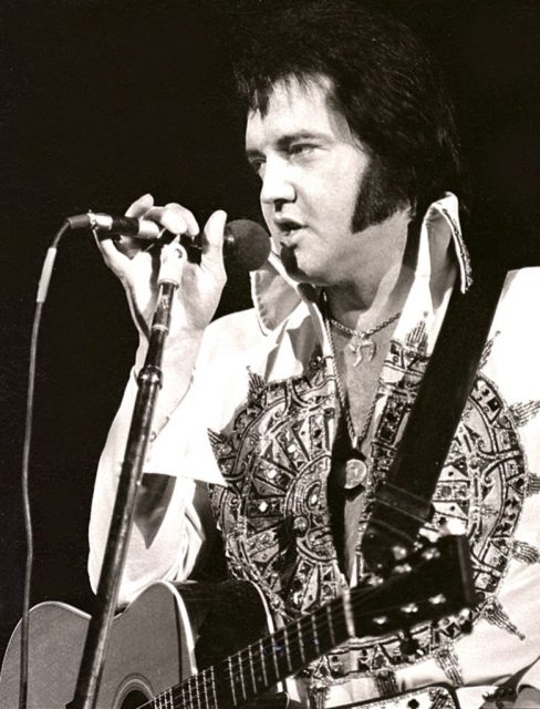 MILWAUKEE, WI – APRIL 1977: Elvis Presley performs in concert at the Milwaukee Arena on April 27, l977 in Milwaukee, Wisconsin. (Photo by Ronald C. Modra/ Getty Images)