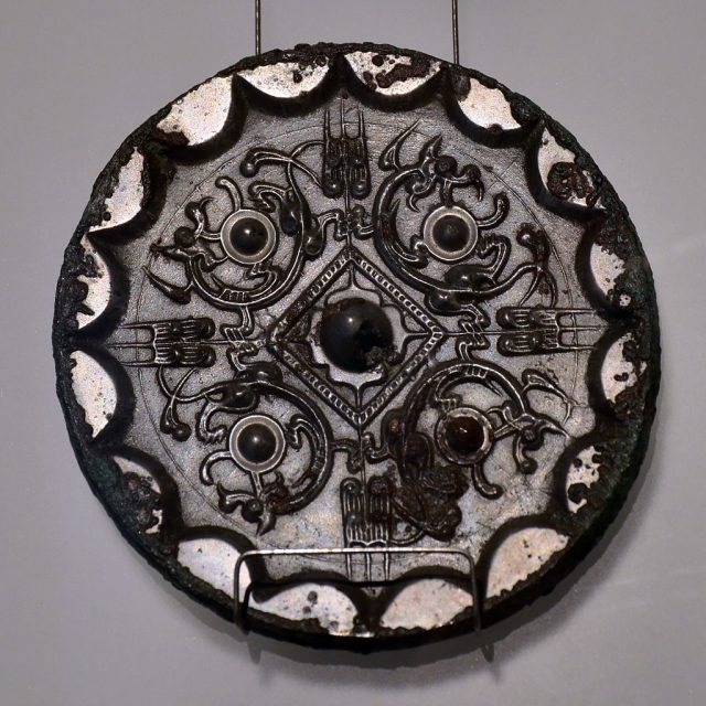 Mirror with leaf motif and four rolled dragons. China, Western Han Dynasty.