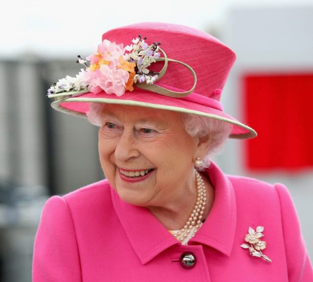 Queen Elizabeth II arrives at the Queen Elizabeth II delivery office in Windsor to mark the 500th anniversary of the Royal Mail.