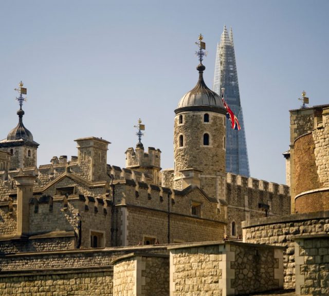 The Tower of London, with a view of the London Shard in the background.