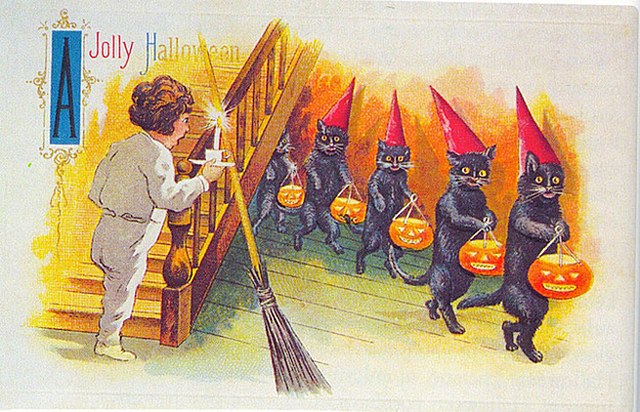 Early 20th century Halloween card featuring black cats