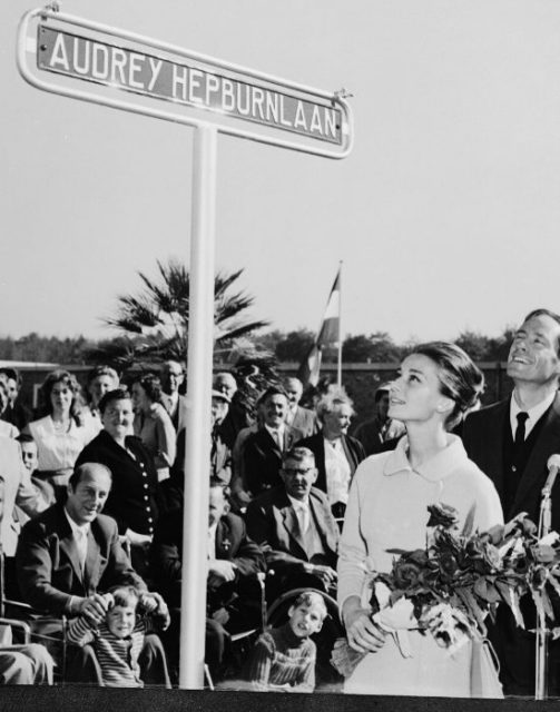 Audrey Hepburn admires a street named in her honor at Doorn, Holland.