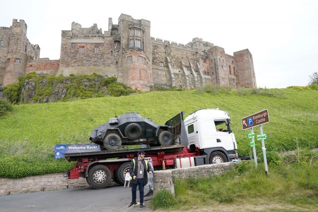 A prop tank is transported to Bamburgh Castle for the filming of Indiana Jones 5.