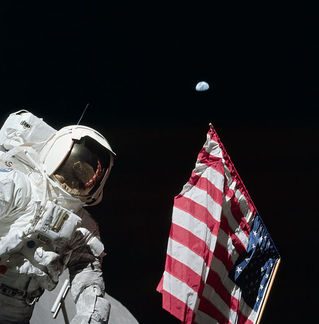 Harrison Schmitt holding the US Flag on the moon