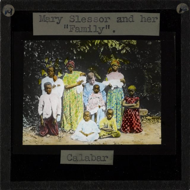 Mary Slessor pictured with a group, mainly of children, of varying age.