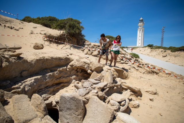 Tourists view the monumental tomb at Cape Trafalgar
